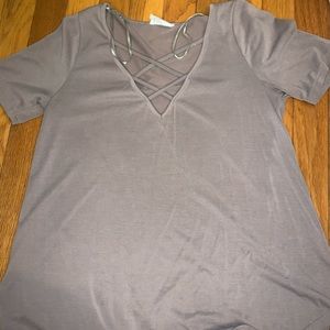 Short sleeve tee with criss cross chest